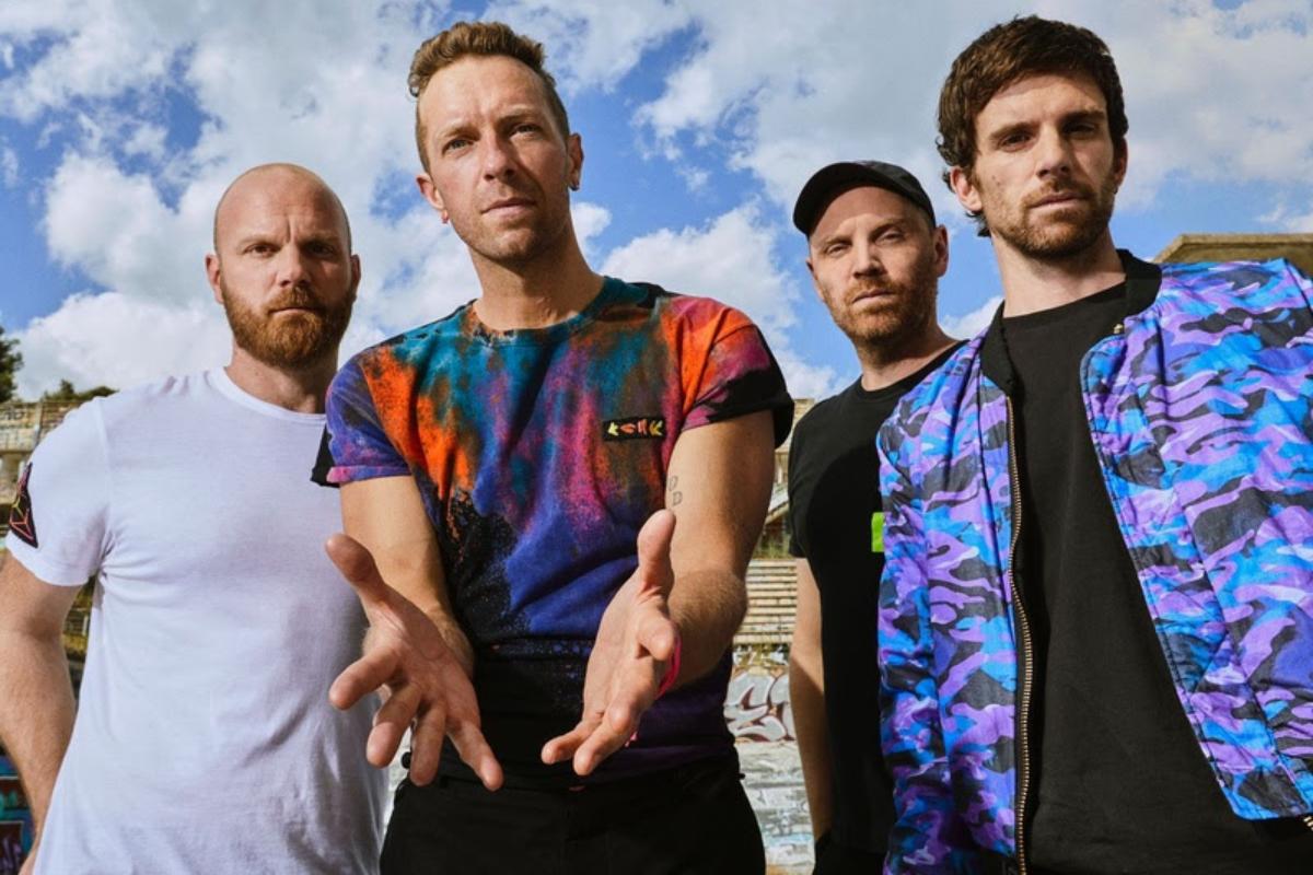 membros do grupo coldplay posando juntos