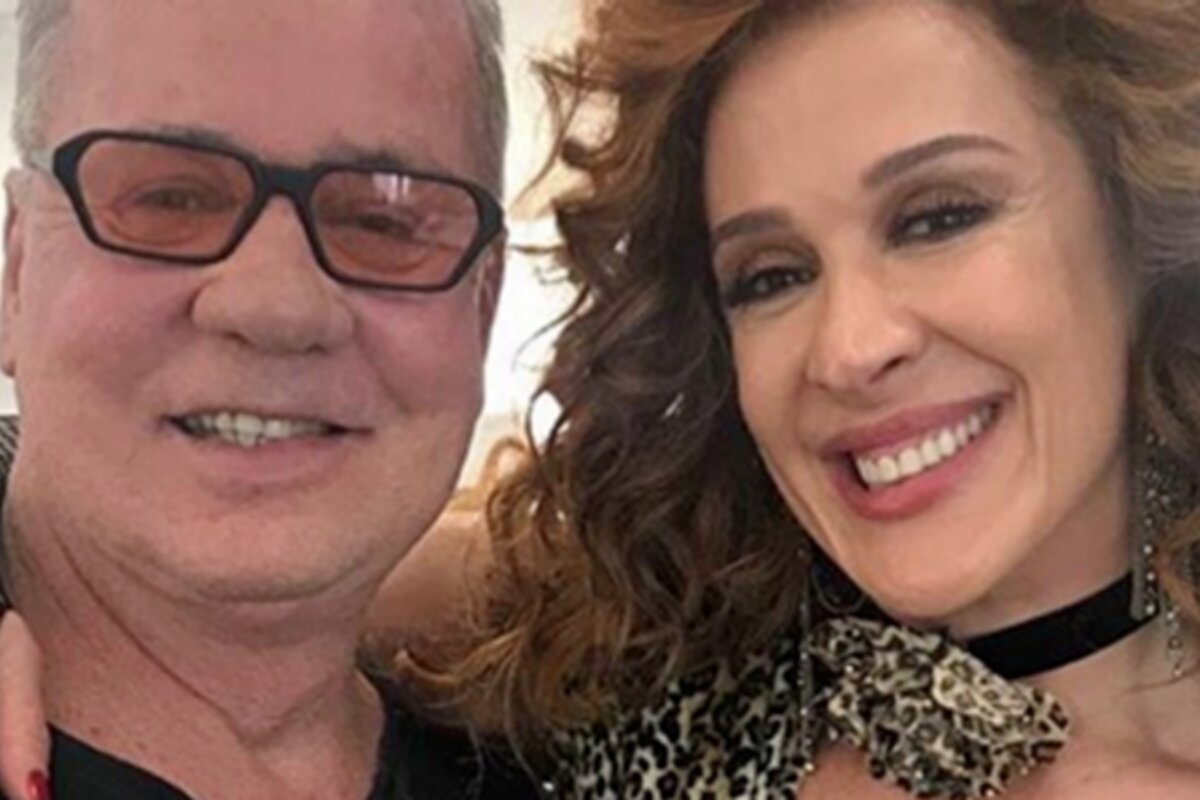 Luiz Fernando Guimarães abraçado a Claudia Raia