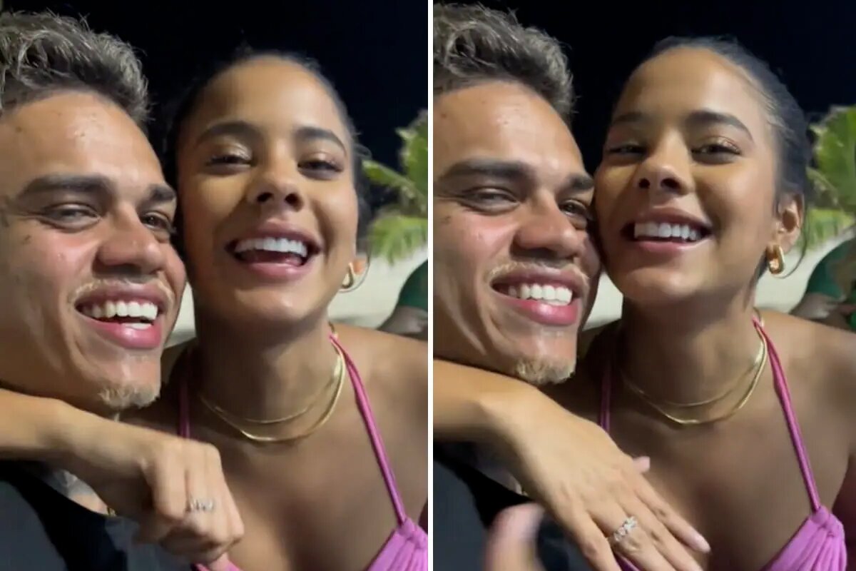 MC Cabelinho e Bella Campos abraçados e sorrindo