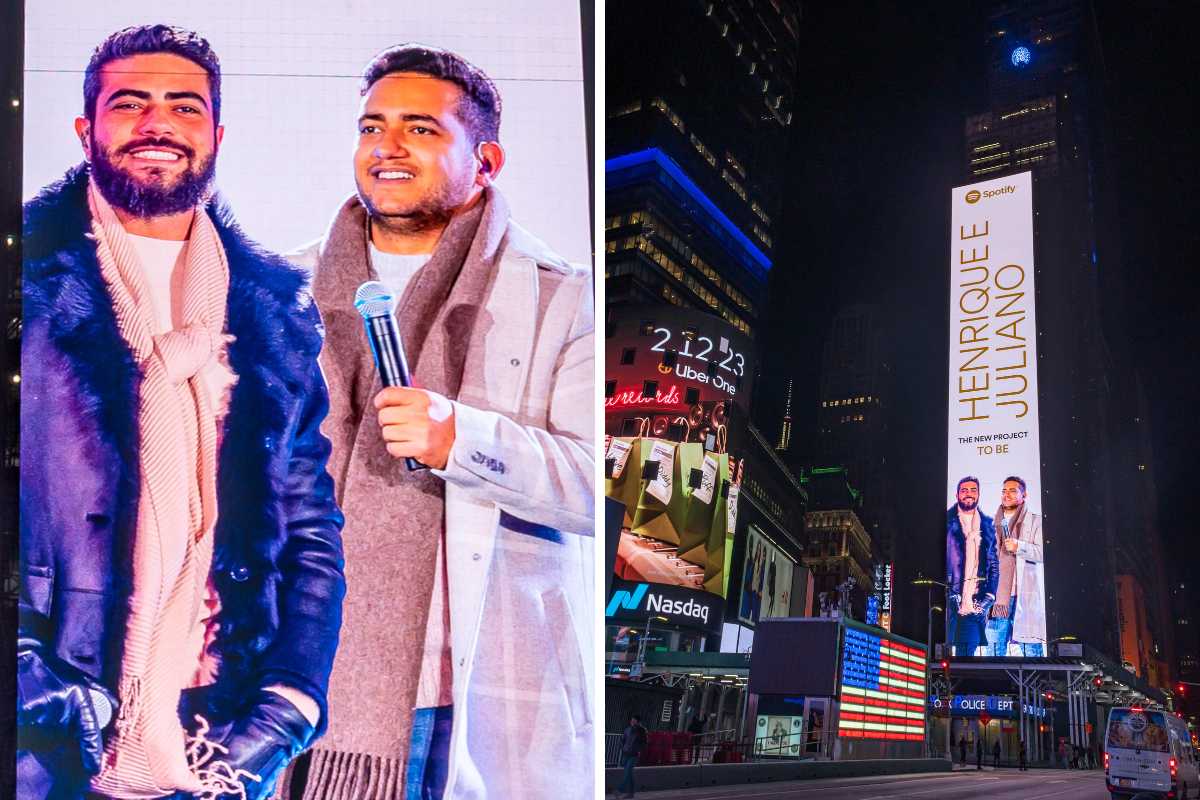 fotomontagemd e retrato de henrique e juliano e capa de álbum na times square garden