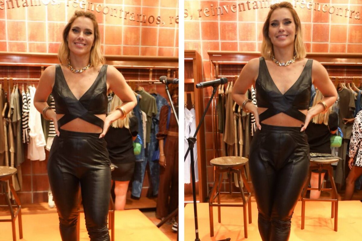 Carolina Dieckmann de barriga de fora, calça e cropped preto