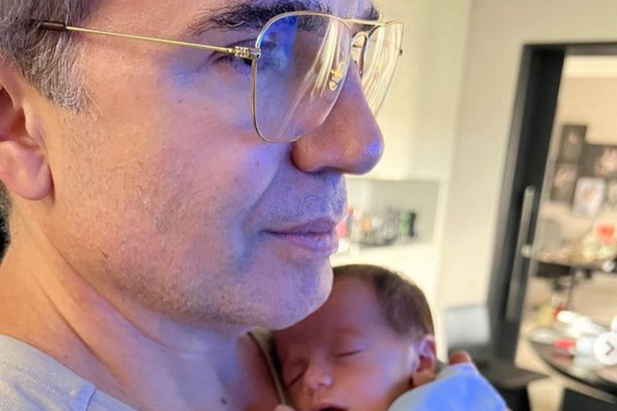 Jarbas Homem de Mello com Luca no colo