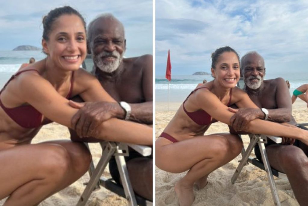 Camila Pitanga e o pai, Antonio Pitanga, na praia