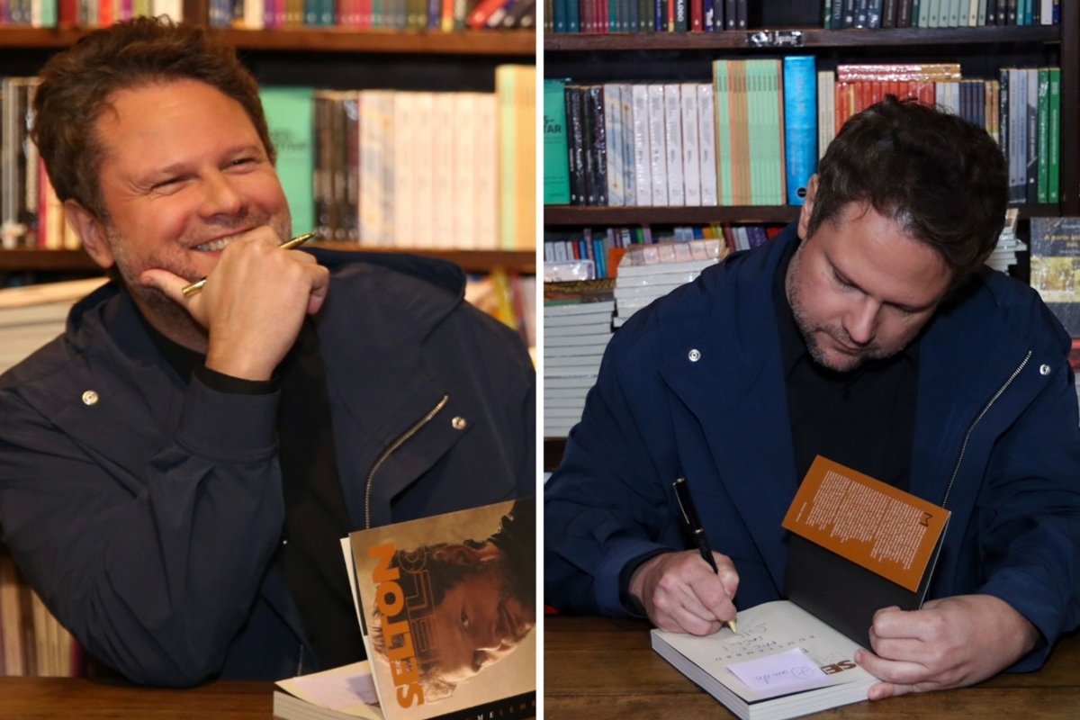 Selton Mello autografando o próprio livro