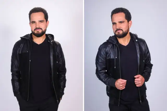 Luciano Camargo todo de preto, em pé, posando em estúdio fotográfico