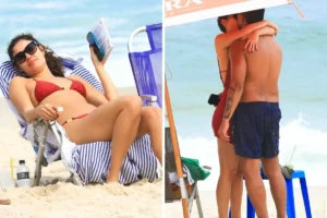 Xamã e Sophie Charlotte curtem praia da Barra aos beijos