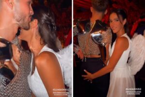 Fantasiada de Julieta, Marquezine dá apalpada em João Guilherme em festa