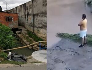 Motociclista é engolido por córrego e arrastado para debaixo de casas; VEJA VÍDEO