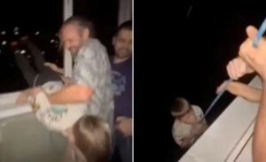 Pai pendura filho da janela de prédio até a mãe chegar