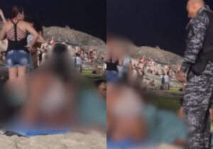Casal é flagrado fazendo saliência na praia e recebe abordagem de PM; veja vídeo