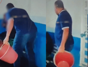 Funcionário joga água para expulsar homem em situação de rua que estava dormindo; VEJA VÍDEO