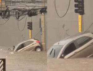 Mulher fica ilhada em enchente e abandona carro que é arrastado; VEJA VÍDEO