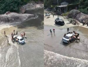 Banhistas ajudam a retirar carro que atolou na faixa de areia de praia; VEJA VÍDEO