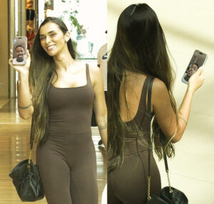 Grávida, Tainá Militão faz chamada de vídeo com o marido, Éder, durante passeio ao shopping